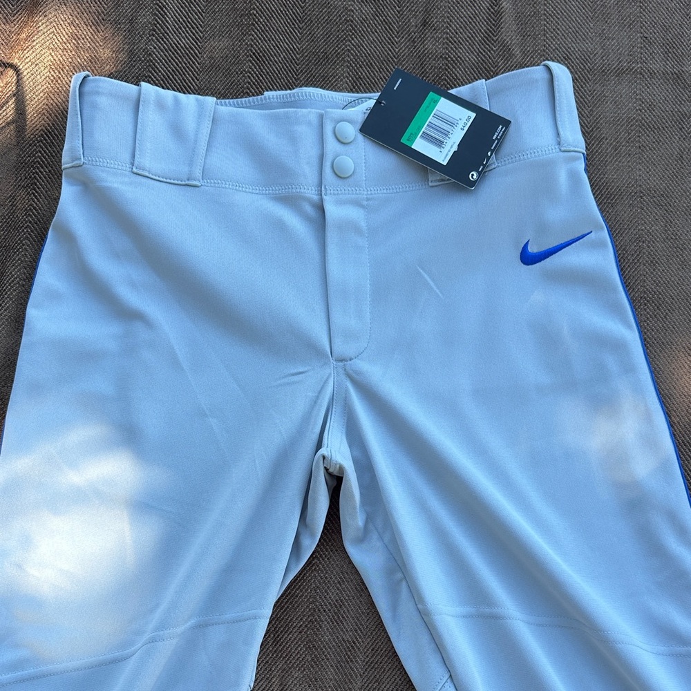 NWT Nike Vipor Light Gray Pants with Royal Blue Swoosh